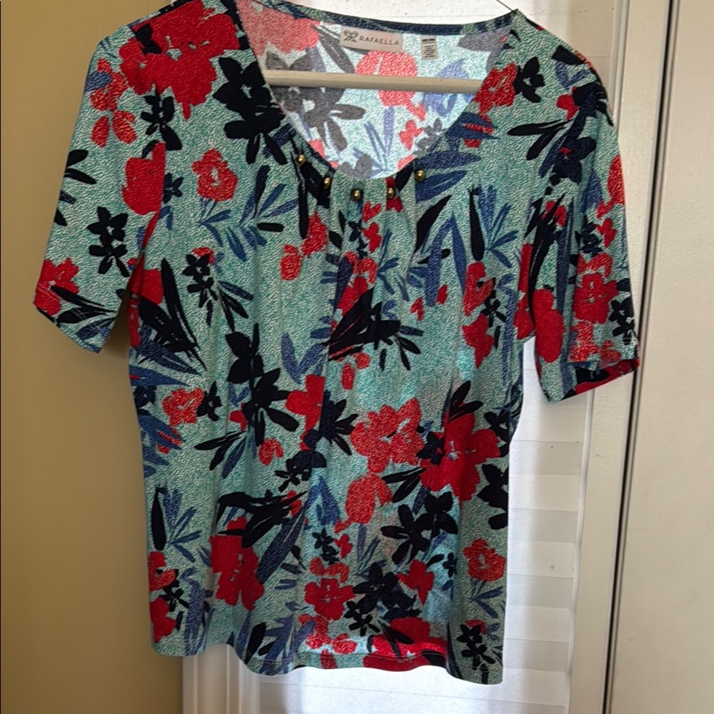Women’s waist length top in size Petite Medium